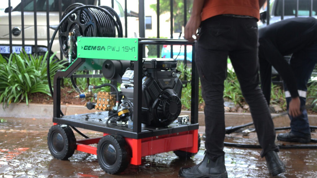 An example of a mobile Drain Jetting Machine being used to unblock a pipe.